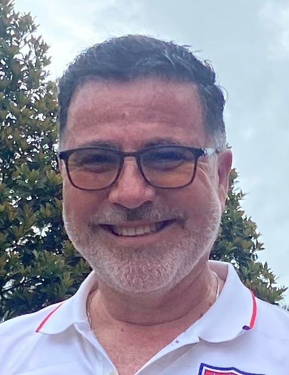 Manny Suarez Member of the Board